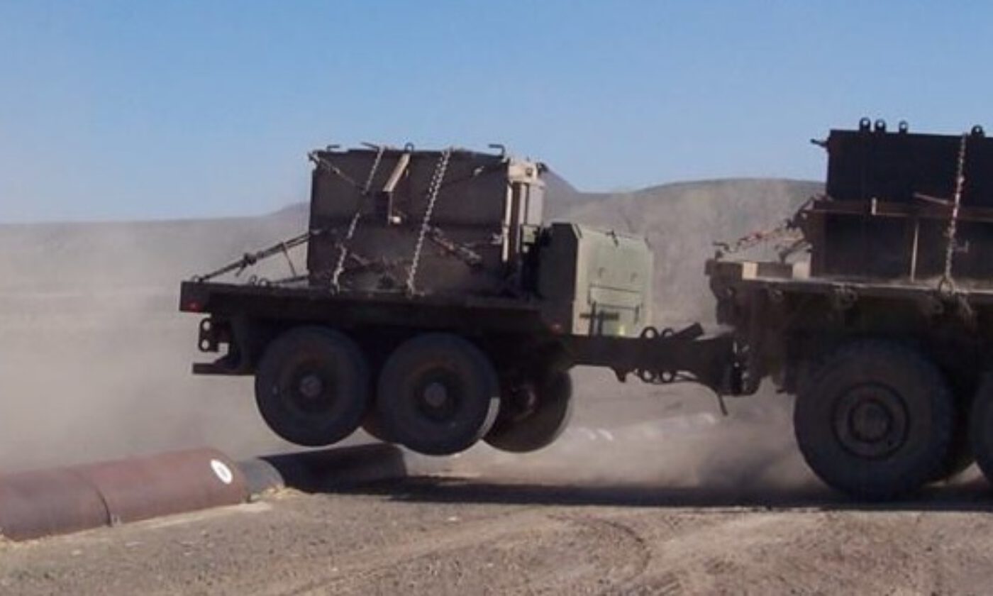 USMC Tactical Trailer being towed at high speeds over a bump