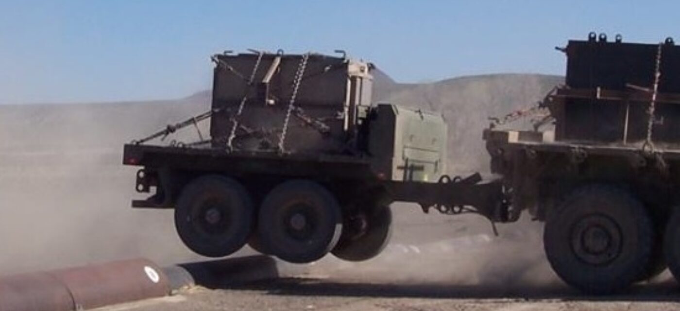 USMC Tactical Trailer being towed at high speeds over a bump