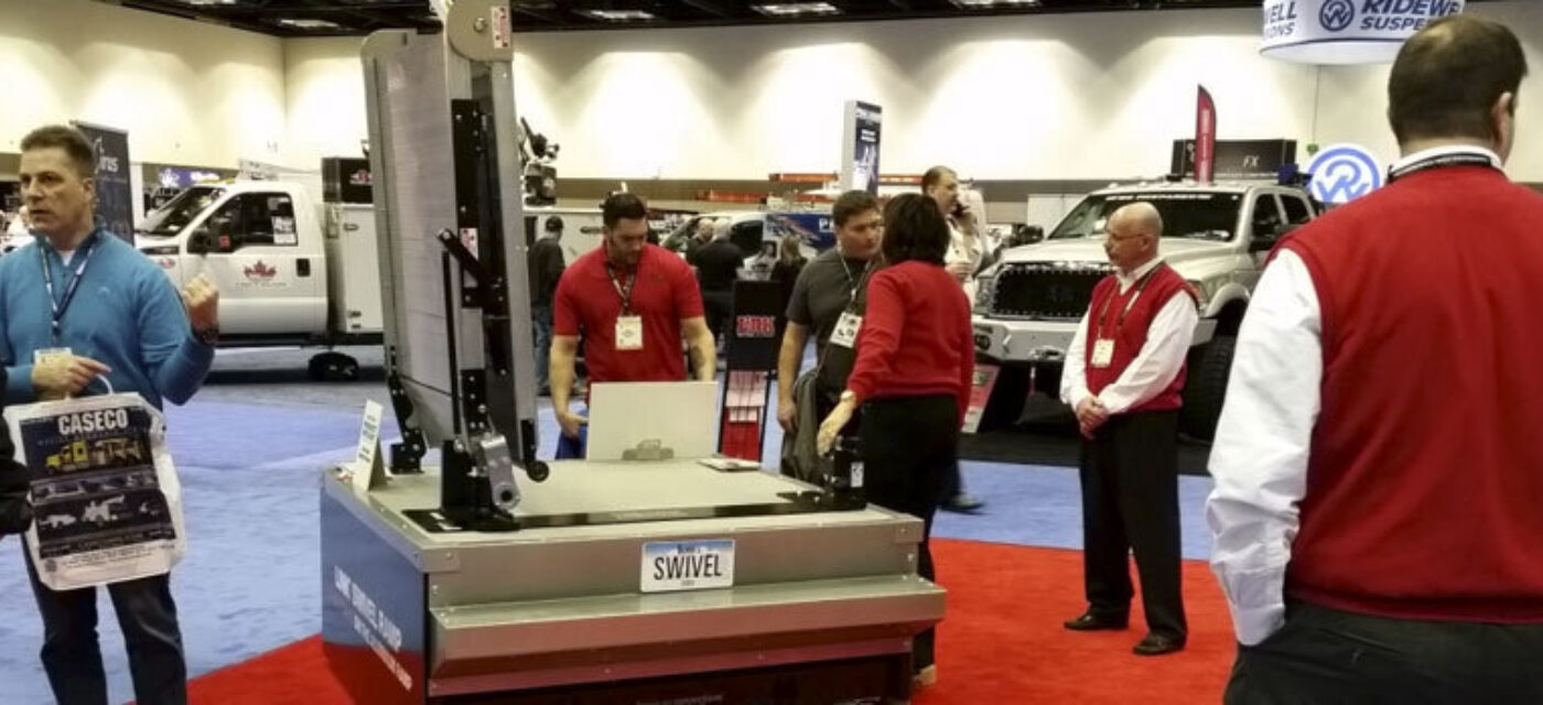 Link representatives at the 2016 NTEA Work Truck Show with the Swivel Ramp
