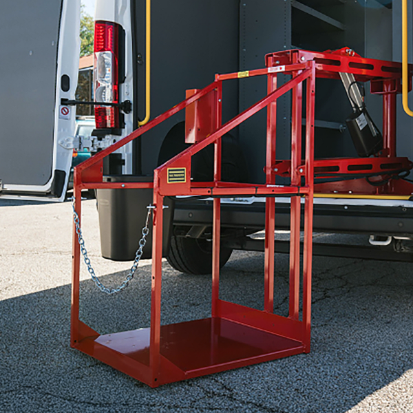 The CL400 machine lift pivoted outside a cargo van.