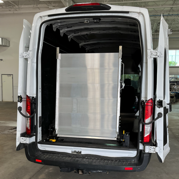 The LSR90 Swivel Ramp in the rear stored position in a cargo van