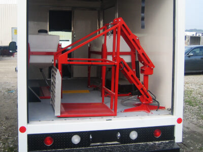 CL400 machine lift pivoted inside cargo van.
