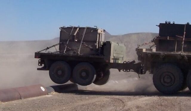USMC Tactical Trailer being towed at high speeds over a bump