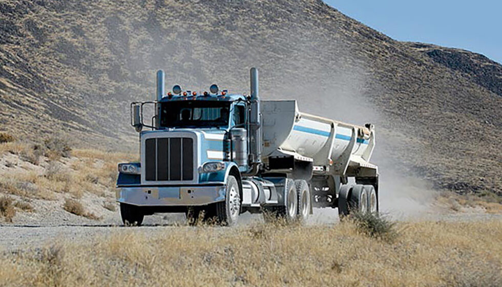 A truck on a gravel road