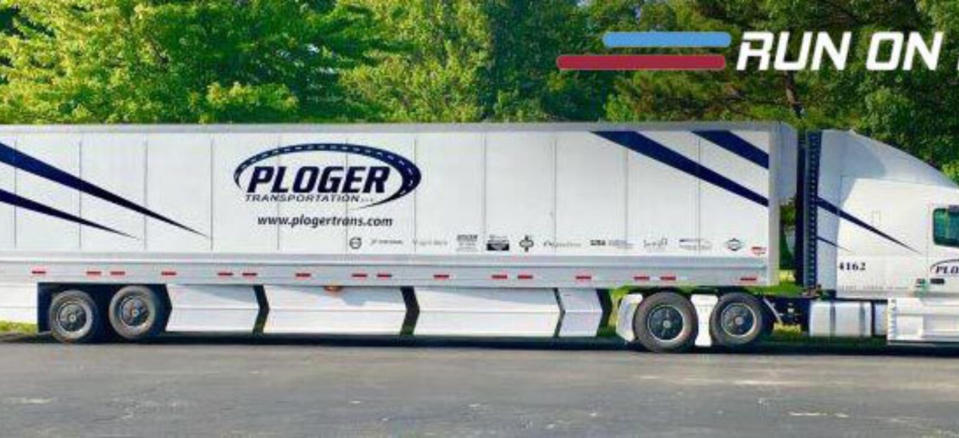 A Ploger Transportation semi truck and trailer overlaid with the Run On Less logo