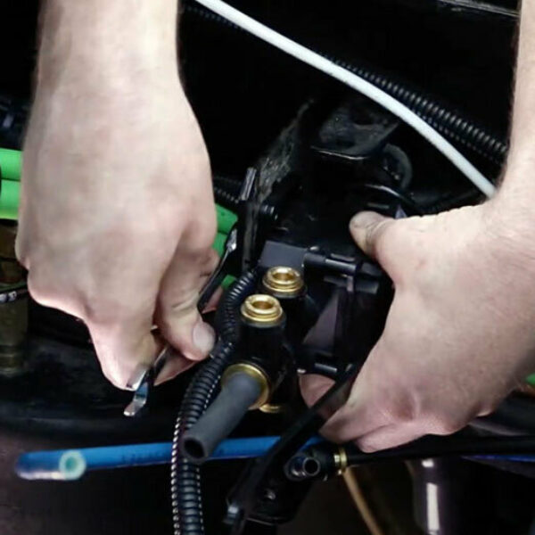 Hands installing a SmartValve unit