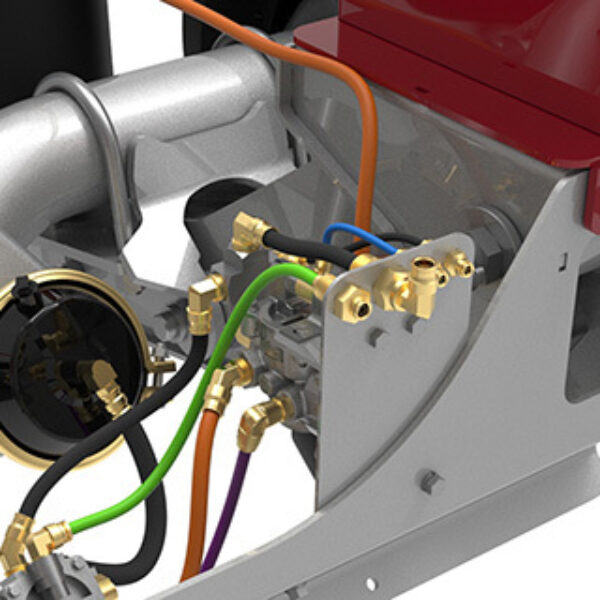 Close up on a non-steerable lift axle's bulkhead air kit with push to connect fittings