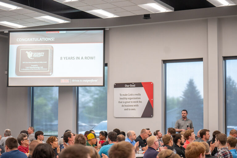 Roger DeBoer presenting Link Employees with the 2024 Dale Sabers Award