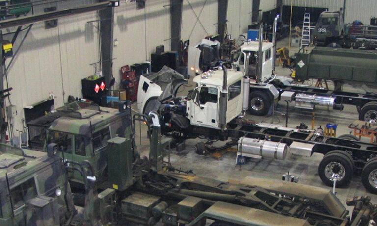 Assembly of four trucks in the Link Suspensions of Canada