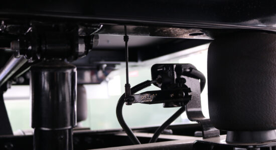 600 series height control valve installed on cab suspension