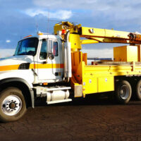 A crane truck with an Air Link Suspension