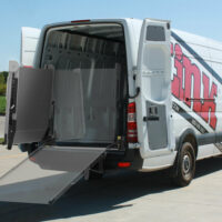 A demonstrative image of the Link swivel ramp, displaying its ability to swivel inside and outside the vehicle, as well as in its upright and deployed positions