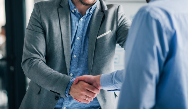 Two men shaking hands