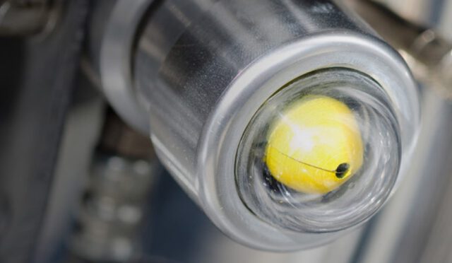 A close up on the Cat's Eye tire pressure monitoring system installed on a tire